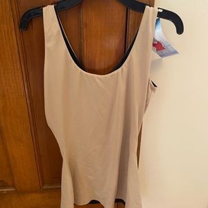 Spank- flipside firmers 4 way tank